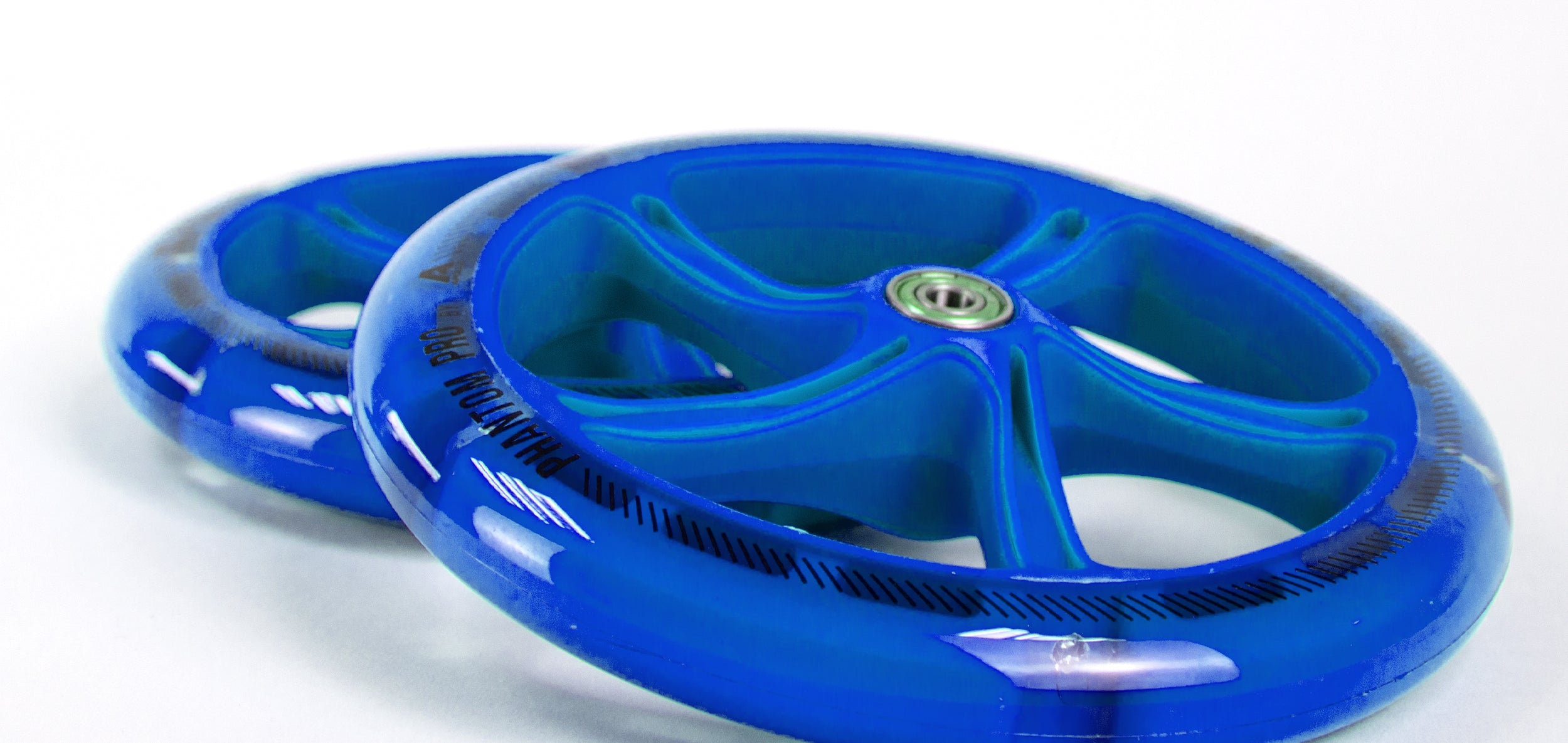 Apollo - 200 mm zestaw zapasowych kół do City Scooter - Phantom / Spectre - LED Niebieski Transparent