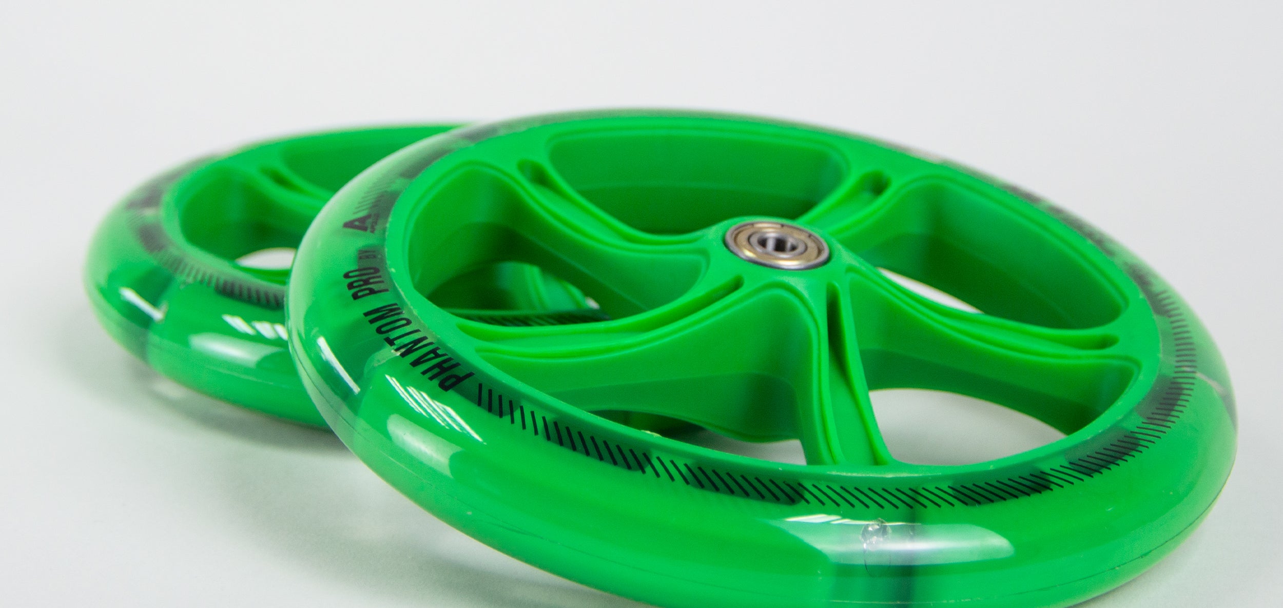 Apollo - 200 mm zestaw zapasowych kół do City Scooter - Phantom / Spectre - LED Zielony Transparent